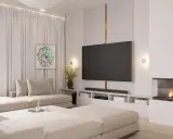 Nowoczesna aranżacja ściany w salonie z telewizorem, kominkiem i wygodną kanapą.