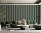 Nowoczesna ściana do salonu w zielone pionowe pasy, z wygodną sofą i fotelem.