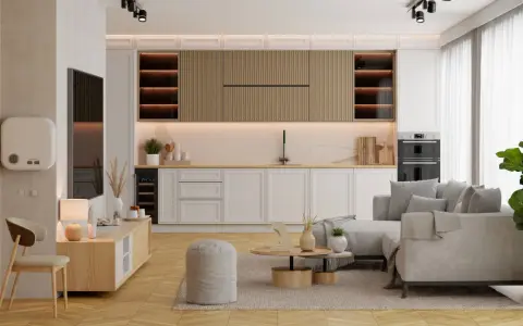 Jak urządzić salon 25m2: jasne meble, kuchnia otwarta na salon, wygodna sofa i stolik kawowy.