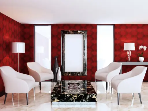 Elegancki salon z tapetą w różne rodzaje czerwieni, kremowymi fotelami i marmurowym stolikiem.
