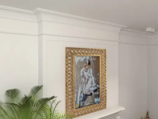 Eleganckie wnętrze z obrazem w złotej ramie i stylowym **klejeniem sztukaterii** na ścianie.