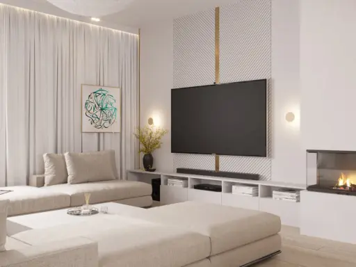 Nowoczesna aranżacja ściany w salonie z telewizorem, kominkiem i wygodną kanapą.