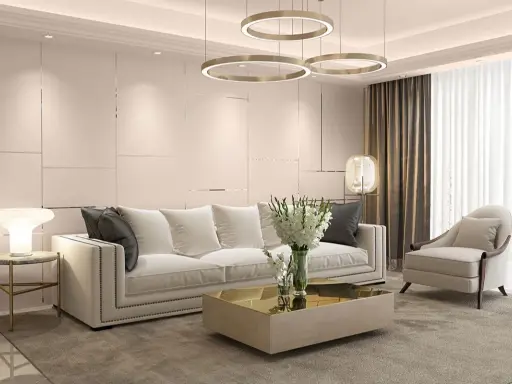 Elegancki art deco salon z białą sofą, złotym stolikiem kawowym i designerskimi lampami.