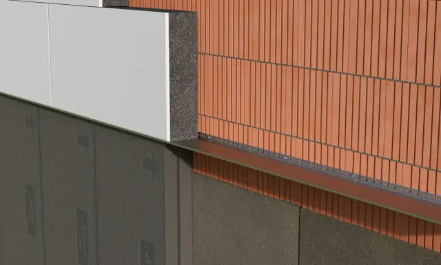 Warstwa styropianu przyklejona do ściany wewnętrznej, widoczny system ocieplenia z cegłą klinkierową i elementami montażowymi.